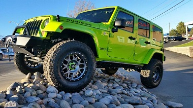 Green Jeep Rubicon with XD Wheels